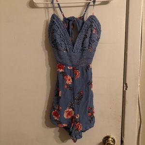 A J for Justify brand, size small, light blue romper with pink floral print.